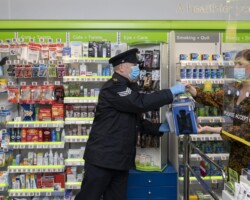 Sgt. Kieran McGinty carrying out a pharmacy collection for the Covid-19 pandemic community response.