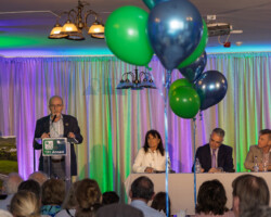 Declan Turnbull giving speech on the stage