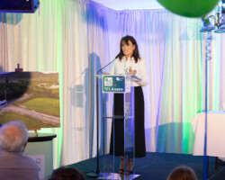 Sarah Togher giving speech on the stage